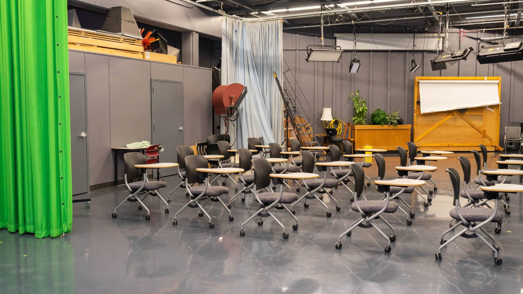 desks in rows in the TV studio